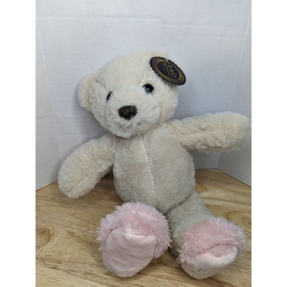 FAO Schwarz Other - F-A-O Schwartz cream white teddy bear with branded fuzzy pink slippers 12 inch